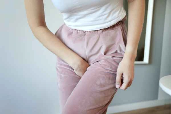 woman struggling with urine incontinence Moss Side